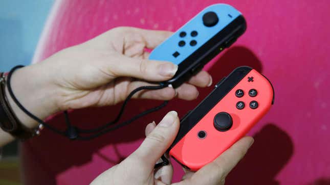 A Nintendo Switch player shows off the Joy-Cons.