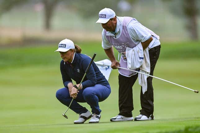Jun 22, 2023; Springfield, New Jersey, USA; Marissa Steen and her caddie line up a putt on the 1st green during the first round of the KPMG Women&#39;s PGA Championship golf tournament.