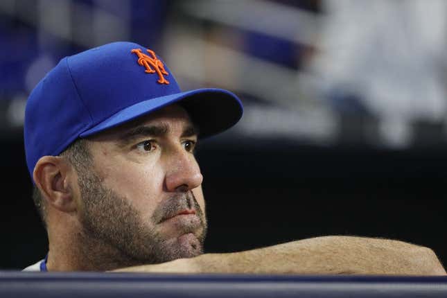 Mar 30, 2023; Miami, Florida, USA; New York Mets starting pitcher Justin Verlander (35) looks on from the dugout prior to the game against the Miami Marlins at loanDepot Park.