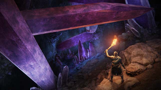 A tarnished looks at a cave of crystals in Elden Ring.