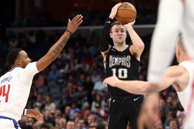 Mar 31, 2023; Memphis, Tennessee, USA; Memphis Grizzlies guard Luke Kennard (10) shoots a three point basket during the first half against the Los Angeles Clippers at FedExForum.