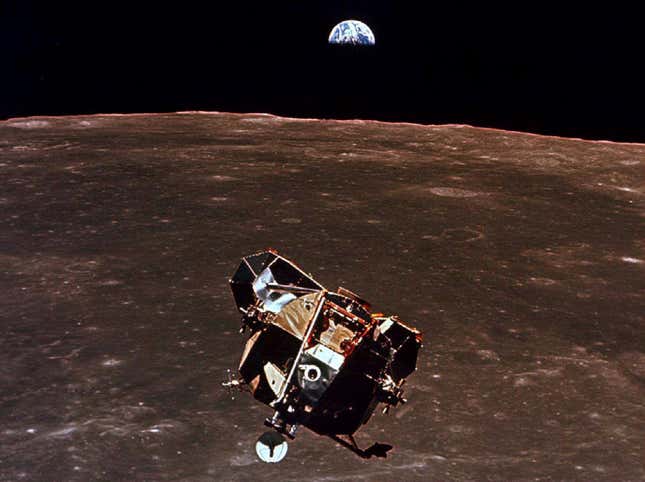 FILE PHOTO 21JUL69- The Apollo 11 lunar module “Eagle” bearing astronauts Neil Armstrong and Edwin E. Aldrin, returns to the command module “Columbia” July 21 1969 following its historic landing on the moon’s surface. This photograph was made by astronaut Michael Collins from “Columbia.” In the background the Earth can be seen rising above the lunar horizon