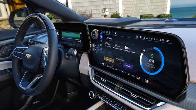An interior shot of the touchscreens on the dashboard of a Chevrolet Equinox EV vehicle.