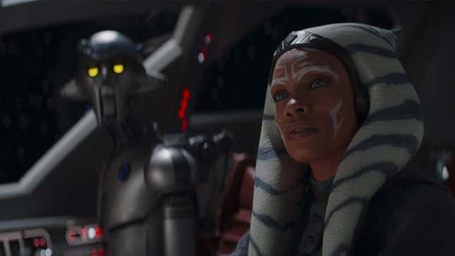 Ahsoka and Huyang sit in the cockpit of her ship. 