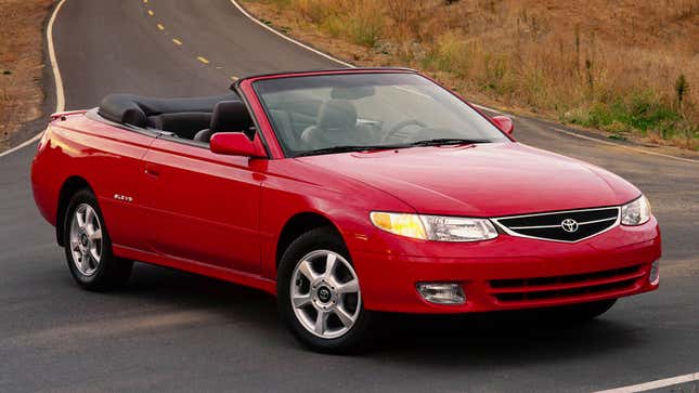 A photo of a red Toyota Camry Solara convertible. 