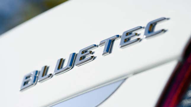 A Bluetec badge on the back of a diesel Mercedes-Benz sedan.