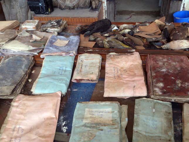 Staff at Shri Pratap Museum washed out antique shawls in tap water and dried them out on the pavement.