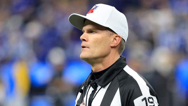 Image for article titled Referee Can’t Help But Grin While Calling Penalty To Bring Back Huge Gain