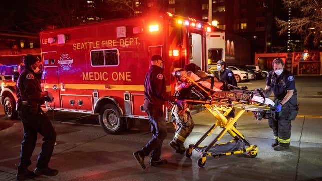 Seattle Fire Department medics transport a stabbing victim on March 10, 2022 in Seattle, Washington. 