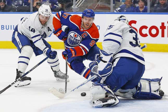 Mar 1, 2023; Edmonton, Alberta, CAN; Toronto Maple Leafs goaltender Ilya Samsonov (35) makes a save on Edmonton Oilers forward Connor McDavid (97) during the third period at Rogers Place.
