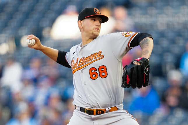 May 2, 2023; Kansas City, Missouri, USA; Baltimore Orioles starting pitcher Tyler Wells (68) pitches during the first inning against the Kansas City Royals at Kauffman Stadium.