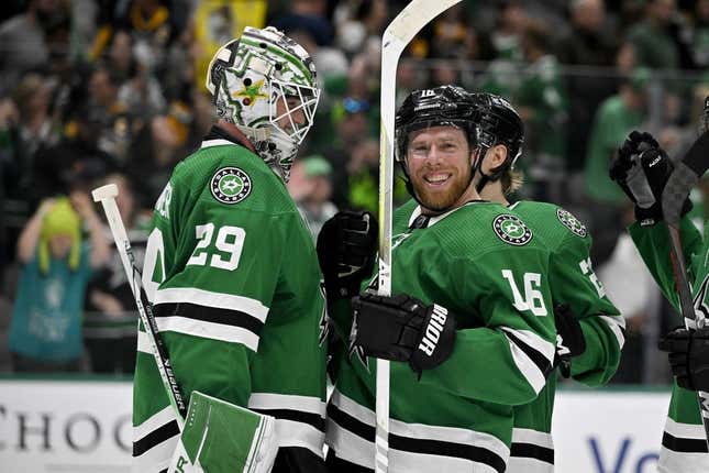 Mar 23, 2023; Dallas, Texas, USA; Dallas Stars goaltender Jake Oettinger (29) and center Joe Pavelski (16) celebrate the victory over the Pittsburgh Penguins at the American Airlines Center.