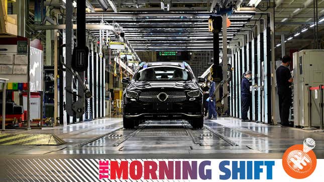 A photo of a Mercedes factory line with an SUV being constructed. 