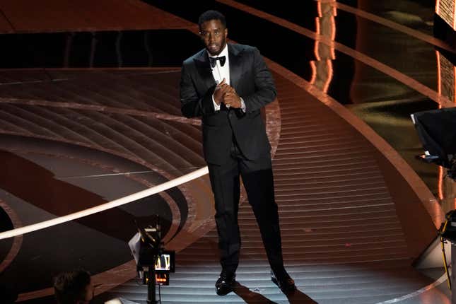 Sean Combs appears on stage at the 2022 Oscars at the Dolby Theatre in Los Angeles.
