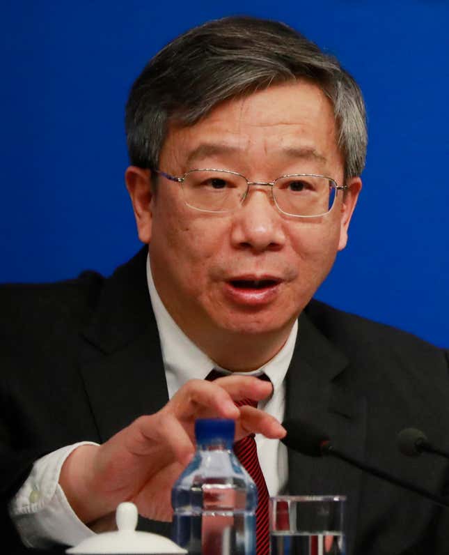 Yi Gang, Deputy Governor of the People's Bank of China (PBC) speaks to reporters during a press conference on the sideline of the fifth session of the 12th National People's Congress (NPC) in Beijing, China, 10 March 2017. The NPC has over 3,000 delegates and is the world's largest parliament or legislative assembly though its function is largely as a formal seal of approval for the policies fixed by the leaders of the Chinese Communist Party. The NPC runs alongside the annual plenary meetings of the Chinese People's Political Consultative Conference (CPPCC), together known as 'Lianghui' or 'Two Meetings'.