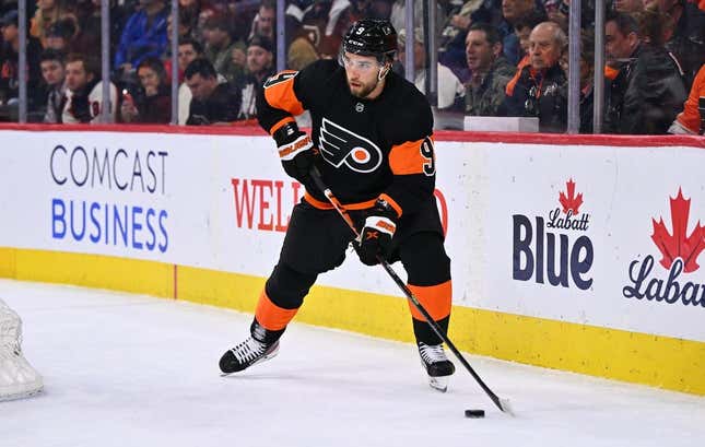 Mar 23, 2023; Philadelphia, Pennsylvania, USA; Philadelphia Flyers defenseman Ivan Provorov (9) controls the puck against the Minnesota Wild in overtime at Wells Fargo Center.