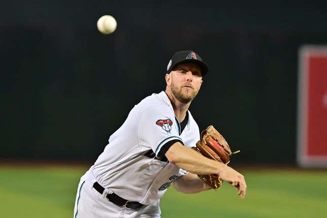 May 10, 2023; Phoenix, Arizona, USA; Arizona Diamondbacks starting pitcher Merrill Kelly (29) throws in the first inning against the Miami Marlins at Chase Field.
