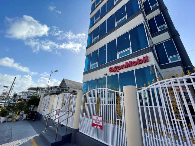 The Exxon Mobil Corp hemmed in with a white wrought-iron fence, pictured in Georgetown, Guyana