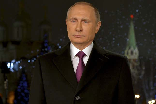 Russian President Vladimir Putin looks on as he delivers his annual New Year address to the nation in Moscow, December 31, 2015.