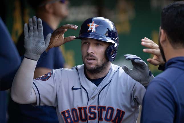 Jul 22, 2023; Oakland, California, USA; Houston Astros third baseman Alex Bregman (2) is greeted by his teammates after hitting a solo home run against the Oakland Athletics during the sixth inning at Oakland-Alameda County Coliseum.