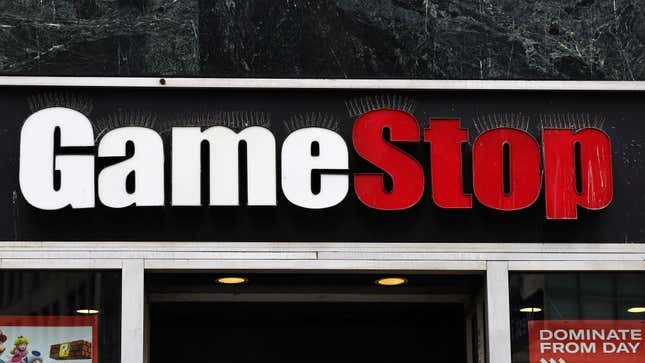 A photo shows the GameStop sign above one of its stores. 