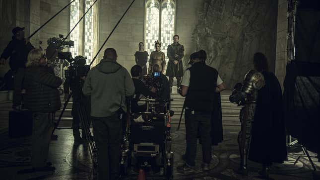 Crew look on as a scene from The Witcher, produced by Netflix, is filmed.