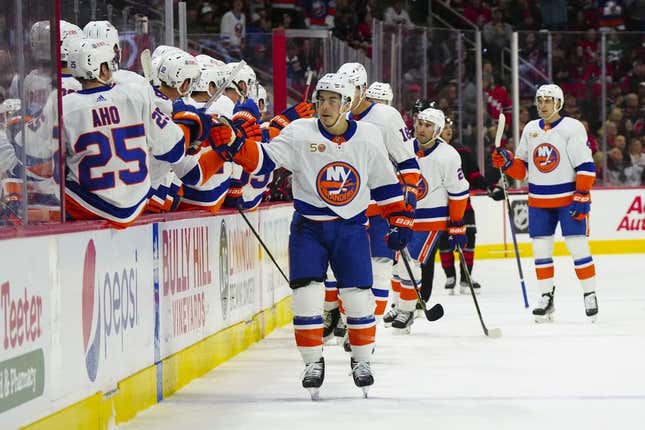 Apr 2, 2023; Raleigh, North Carolina, USA;  New York Islanders center Jean-Gabriel Pageau (44) celebrates his goal against the Carolina Hurricanes during the first period at PNC Arena.