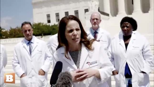 Simone Gold, founder of America’s Frontline Doctors, at a strange press conference in the summer of 2020 promoting unproven treatments against covid-19.