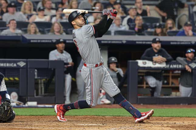 Apr 14, 2023; Bronx, New York, USA; Minnesota Twins shortstop Carlos Correa (4) looks up at his solo home run during the sixth inning against the New York Yankees at Yankee Stadium.