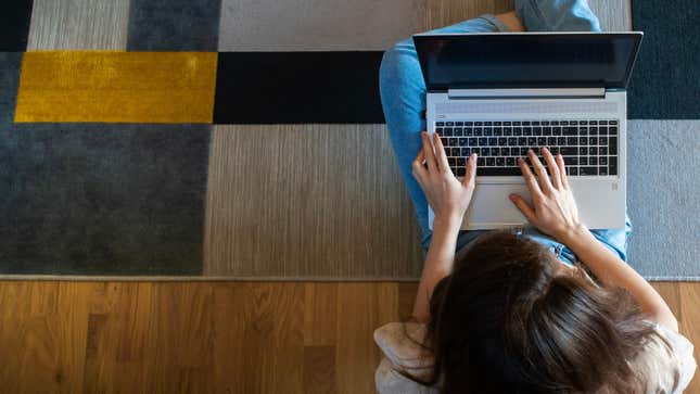 aerial view of woman on a laptop