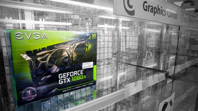 A lonely EVGA GPU sits on an otherwise empty store shelf.