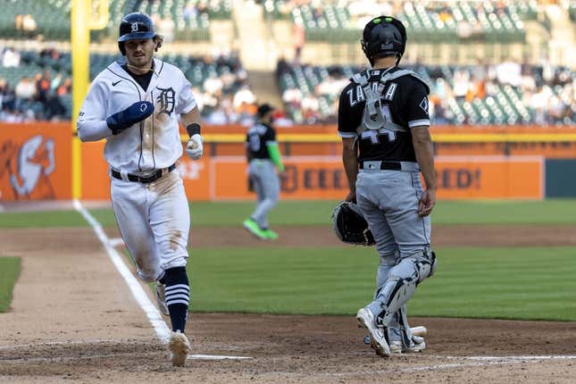 May 25, 2023; Detroit, Michigan, USA; Detroit Tigers second baseman Zach McKinstry (39) scores a run against the Chicago White Sox in the fourth inning at Comerica Park.