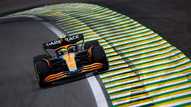 A photo of Lando Norris racing his Mclaren F1 car in Brazil. 
