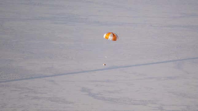 A training model of the OSIRIS-REx sample return capsule is seen during a drop test on Aug. 30, 2023, at the Department of Defense’s Utah Test and Training Range.