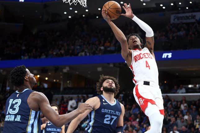 Mar 22, 2023; Memphis, Tennessee, USA; Houston Rockets guard Jalen Green (4) drives to the basket during the first half against the Memphis Grizzlies at FedExForum.