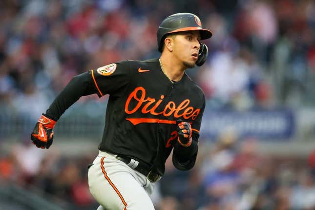 May 5, 2023; Atlanta, Georgia, USA; Baltimore Orioles second baseman Ramon Urias (29) hits a single against the Atlanta Braves in the second inning at Truist Park.
