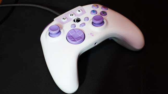 A Turtle Beach React-R controller sits on a rubber mat.