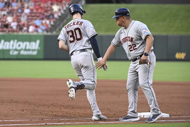 Jun 29, 2023; St. Louis, Missouri, USA; Houston Astros right fielder Kyle Tucker (30) is congratulated by Houston Astros first base coach Omar L pez (22) after Tucker hits a three-run home run against the St. Louis Cardinals in the sixth inning at Busch Stadium.