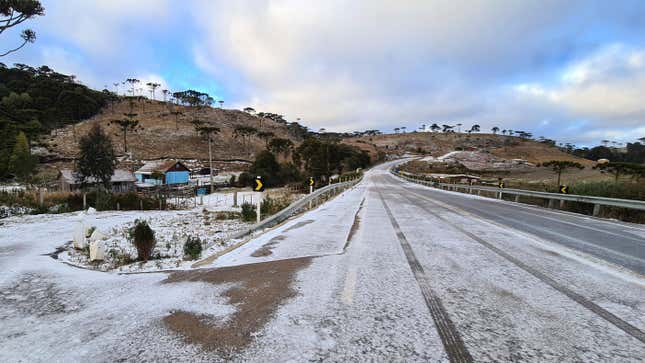 Snow covers a road in Sao Joaquim, Brazil, Thursday, July 29, 2021.