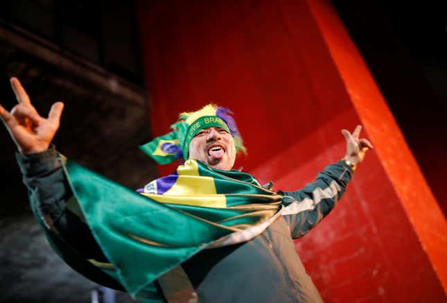 A Bolsonaro voter celebrates his candidate’s victory.