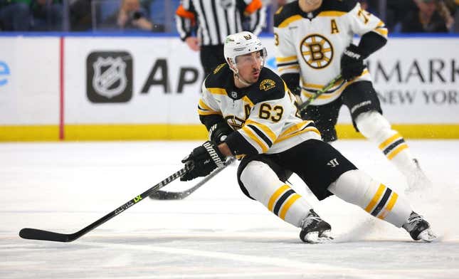 Mar 19, 2023; Buffalo, New York, USA;  Boston Bruins left wing Brad Marchand (63) looks for the puck during the first period against the Buffalo Sabres at KeyBank Center.