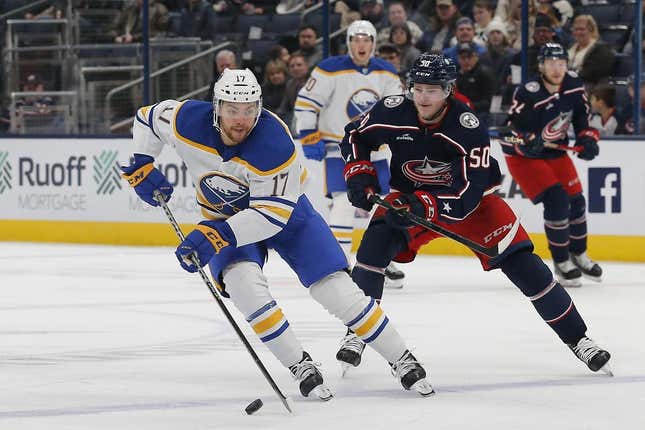 Dec 7, 2022; Columbus, Ohio, USA; Buffalo Sabres center Tyson Jost (17) carries the puck as Columbus Blue Jackets left wing Eric Robinson (50) trails the play during the first period at Nationwide Arena.
