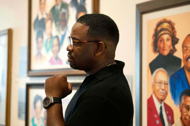Devon Henry, the contractor who dismantled Richmond’s Confederate monuments, has a conversation during the unveiling of “The Thirteen Stars” charity NFT Collection on July 29, 2022, at the Black History Museum in Richmond. 