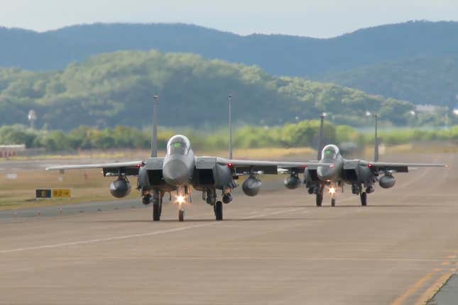 In this image taken from video, South Korean Air Force’s F15K fighter  jets prepare to take off Tuesday, Oct. 4, 2022, in an undisclosed  location in South Korea.