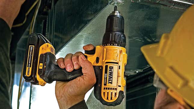 The Dewalt cordless drill in action.