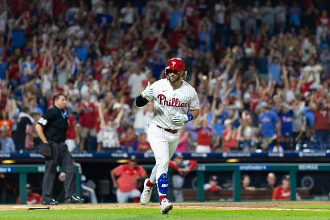 Aug 8, 2023; Philadelphia, Pennsylvania, USA; Philadelphia Phillies designated hitter Bryce Harper (3) reacts after hitting a two RBI home run during the fifth inning against the Washington Nationals at Citizens Bank Park.