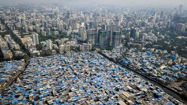 Luxury townships, modest buildings, and slums share space in an immensely crowded city. Affordable housing remains a distant dream in Mumbai.