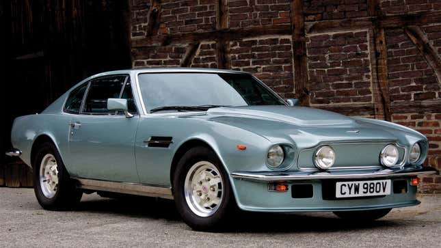 A photo of a pale blue Aston Martin Vantage from the 1970s. 