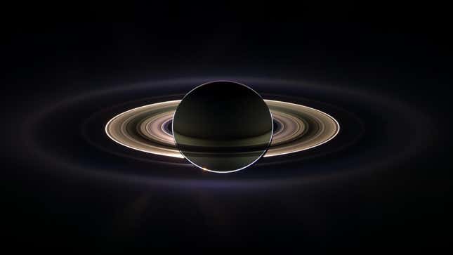 A composite image of a backlit Saturn with its rings illuminated by the Sun, taken by Cassini in 2006.