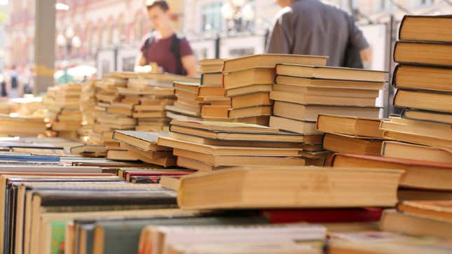 stack of used books in a bookstore